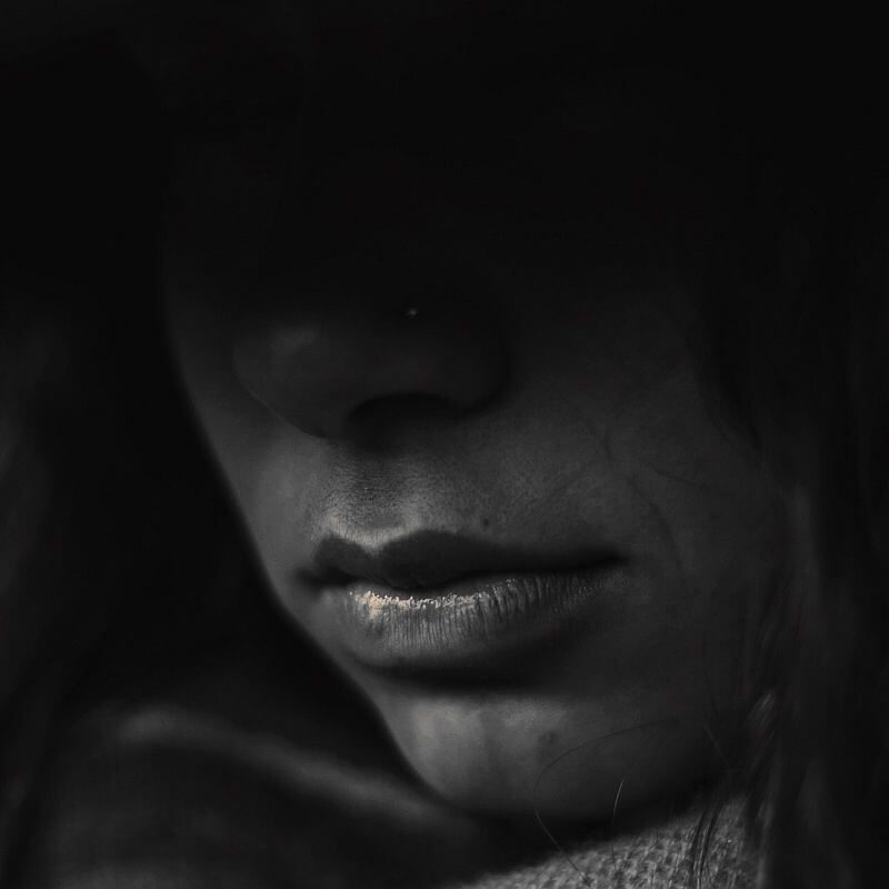 grayscale photo of person's lips